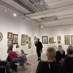 Listeners sit in on Betty Carpick’s Artist Talk at Co. Lab Gallery and Arts Centre, 2023.